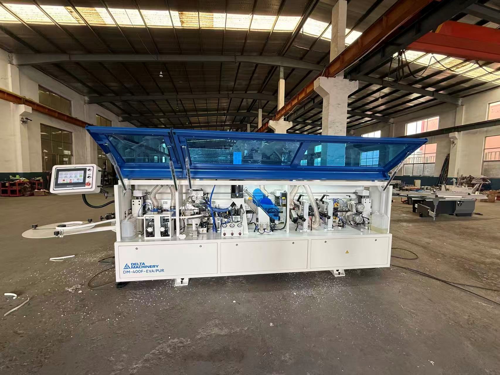 Автоматический кромкооблицовочный станок DM-400F EVA/PUR фото 1